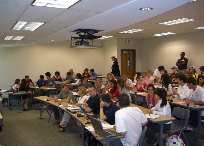 Photos of students and professionals participating in global Odyssey workshops