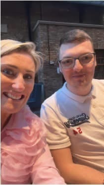 Two people smiling together