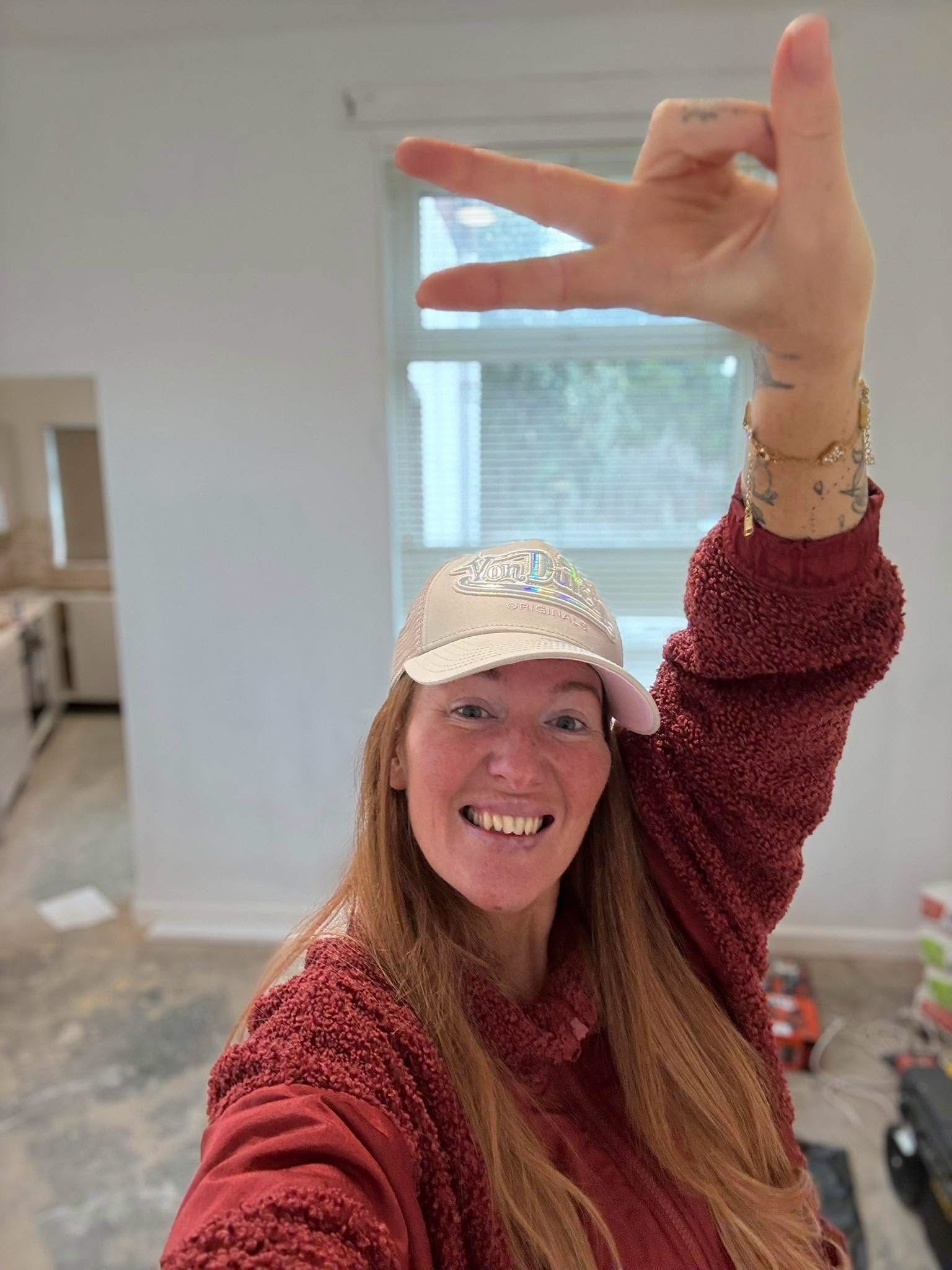 Woman celebrating in a property
