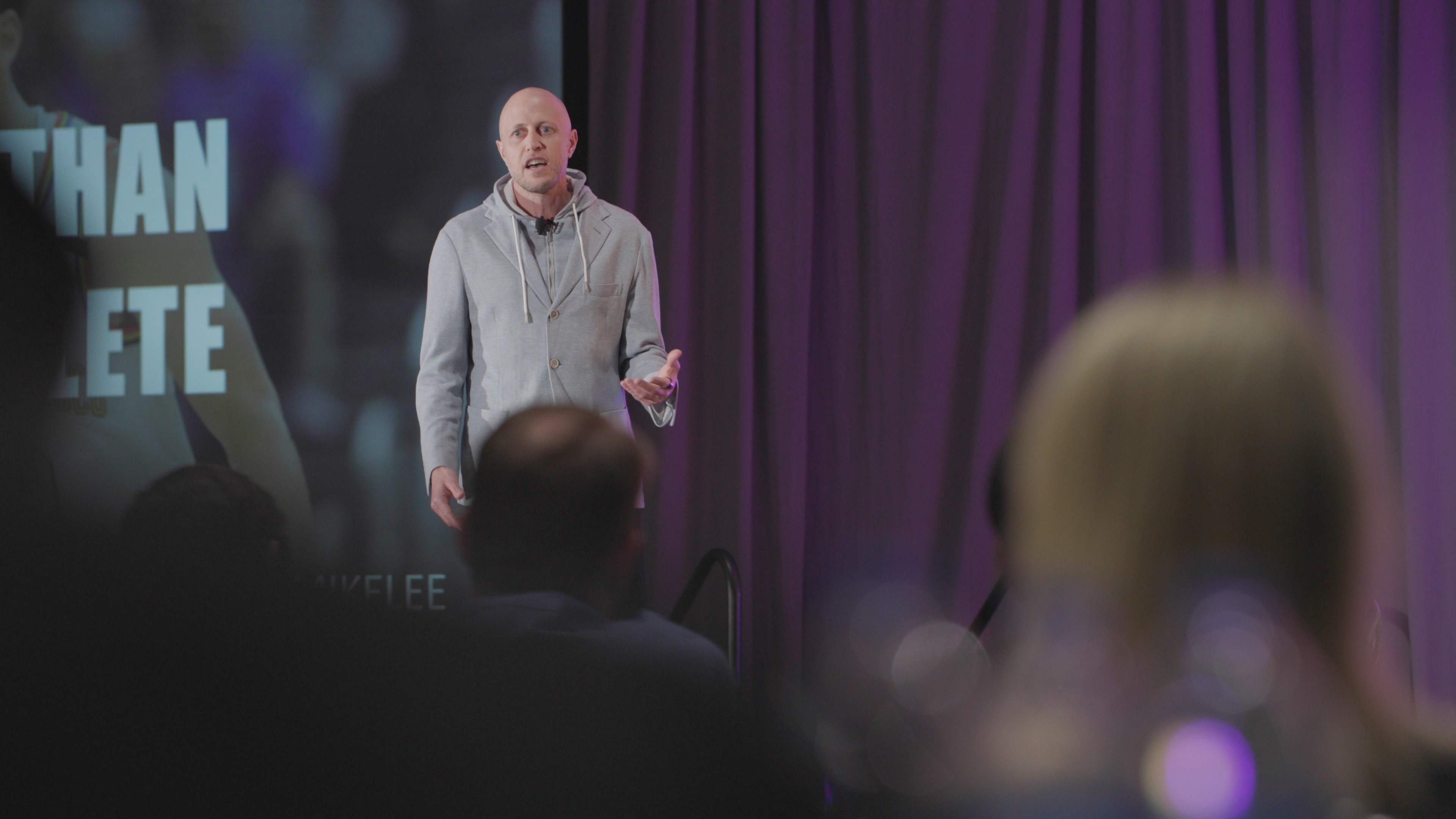 Mike Lee speaking to a room of leaders