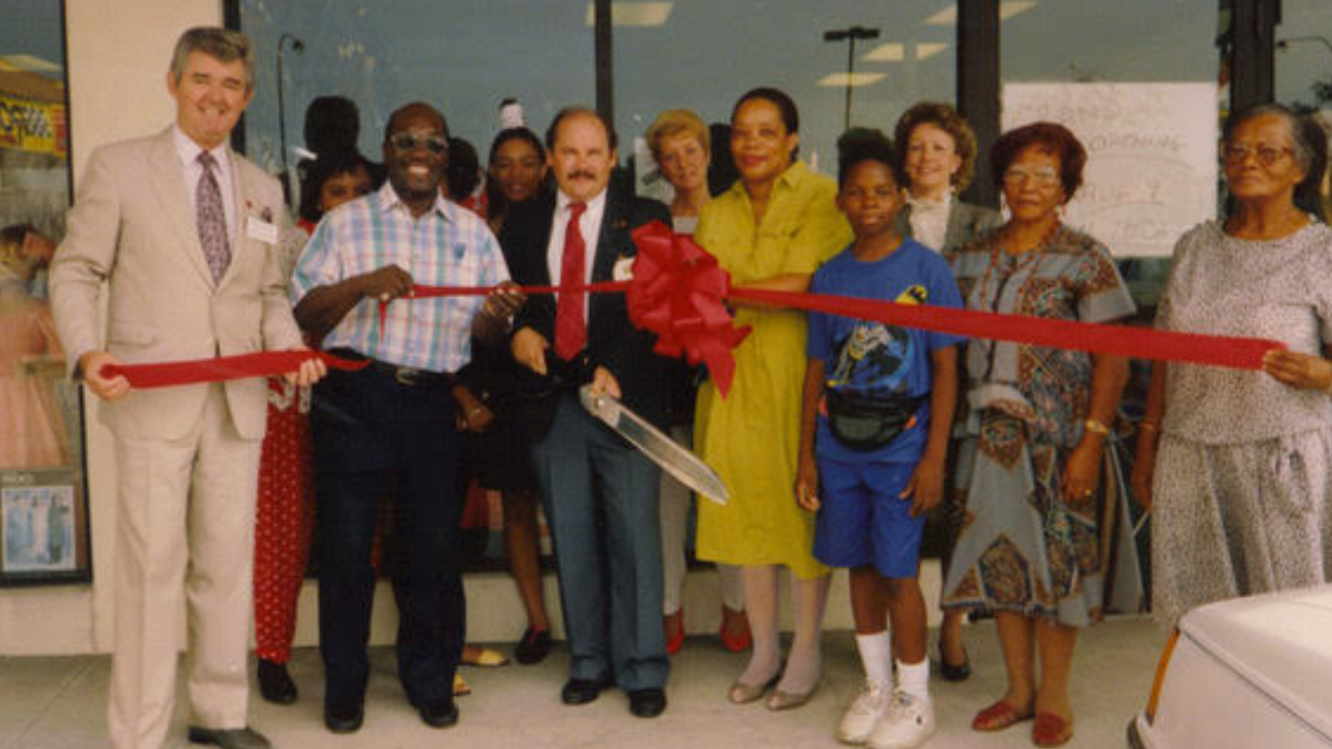 Daniyel Bingham and his grandmother at the opening of KayDan Fashion and Boutique