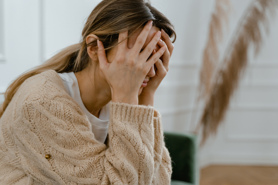woman stressed about her home selling situation